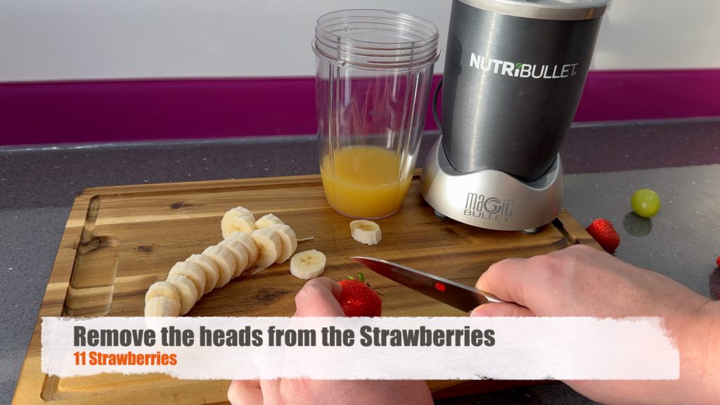 Remove heads from strawberries